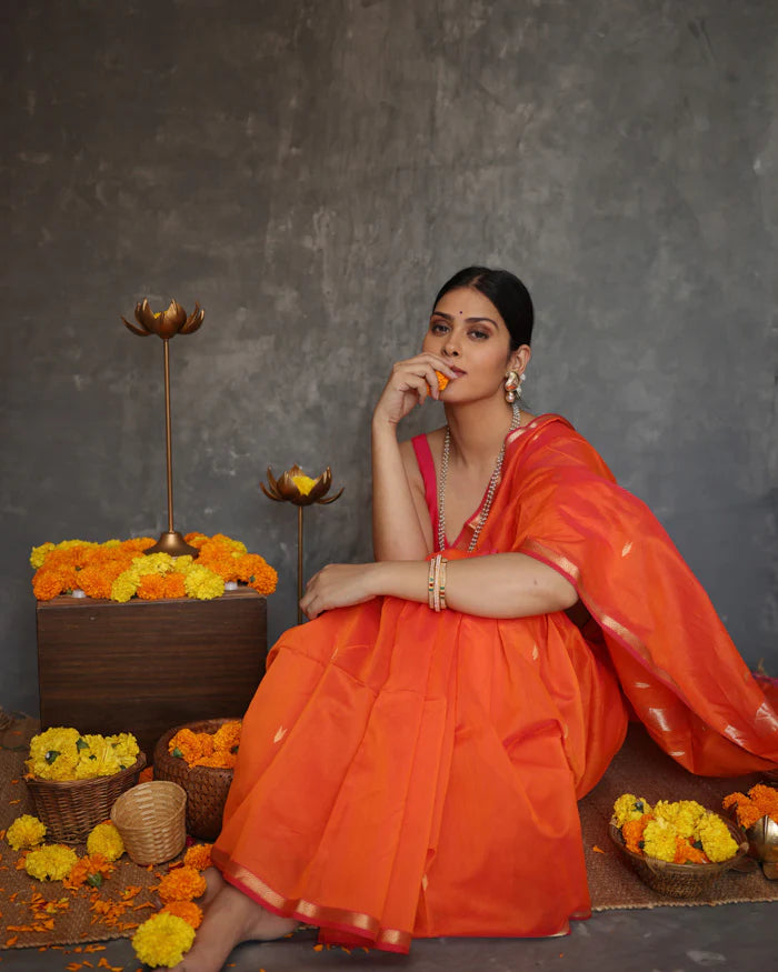 Phenomenal Orange Cotton Silk Saree With Redolent Blouse Piece