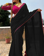 Panoply Black Georgette Saree With Handmade Tussels