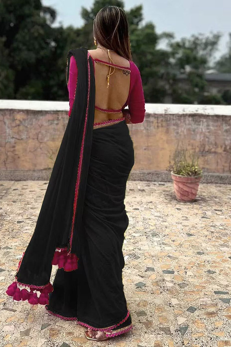 Panoply Black Georgette Saree With Handmade Tussels