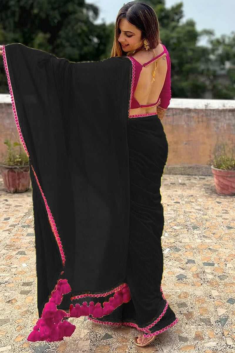 Panoply Black Georgette Saree With Handmade Tussels