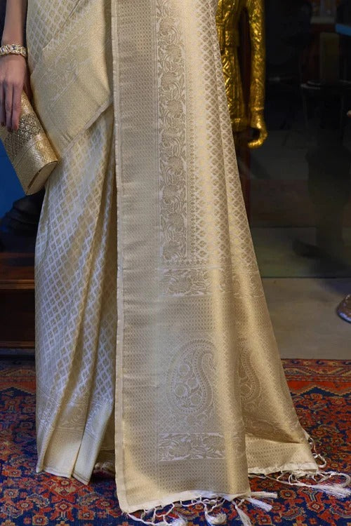 Elision Beige Kanjivaram Silk Saree With Dazzling Blouse Piece