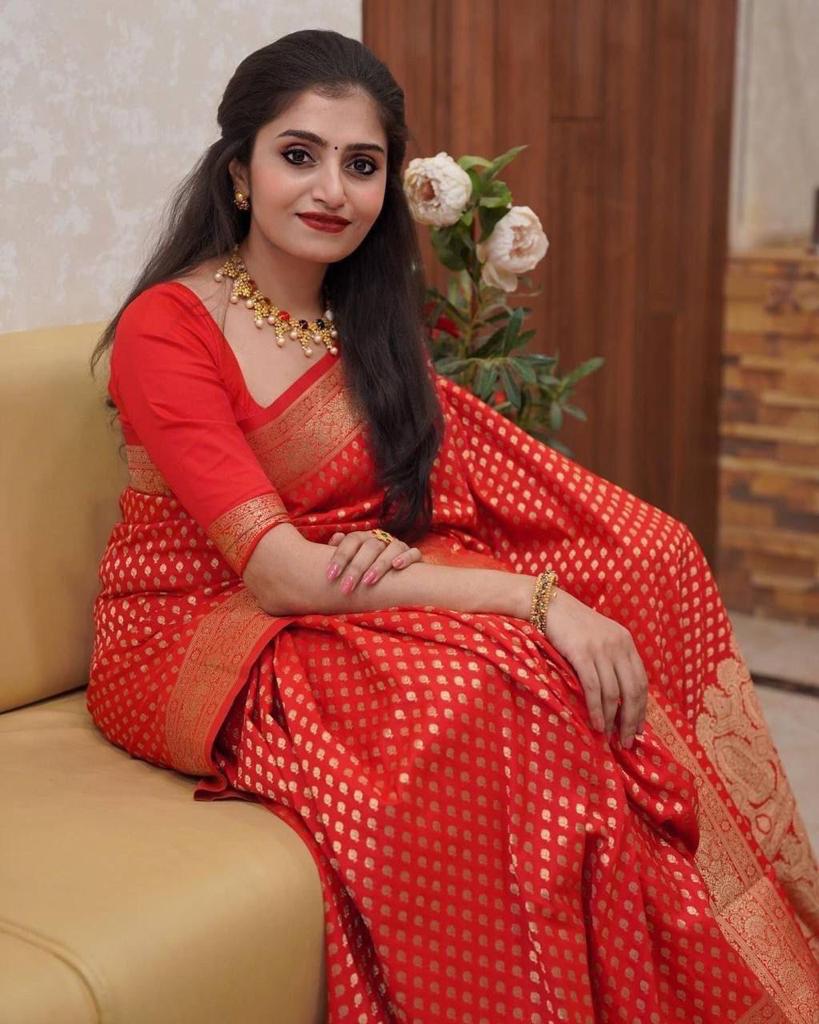 An insanely Red Color Soft Banarasi Silk Saree With Blissful Blouse Piece